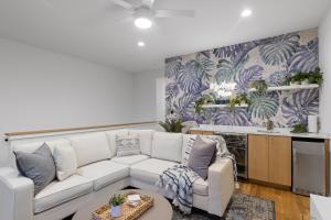 a living room with a couch and a table at Azul - An Atomic Ridge Home in Chattanooga