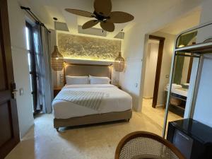 Postel nebo postele na pokoji v ubytování Hotel Casa Sonara