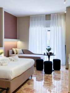 Ένα ή περισσότερα κρεβάτια σε δωμάτιο στο Casa Almika Abate Gimma +58 φωτογραφίες