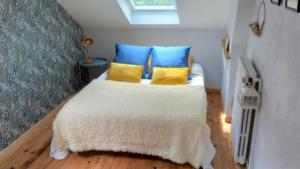 Posteľ alebo postele v izbe v ubytovaní La Maison de Sylvie, chambres d'hôtes à Tarbes