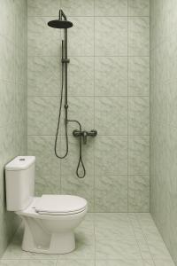 a bathroom with a toilet and a shower at Appartement Meublé aux Almadies Élégance Confort et Sérénité in Ngor +37 photos