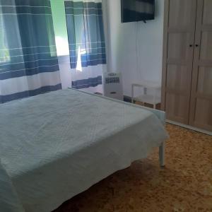 Postel nebo postele na pokoji v ubytování I Pini 8