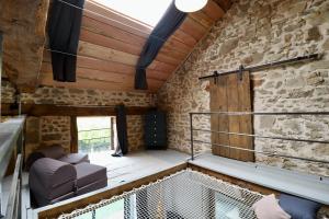 a view of the inside of a tiny house at La grange de Louise in La Chapelle-Taillefert