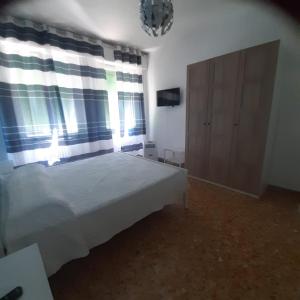 Postel nebo postele na pokoji v ubytování I Pini 8