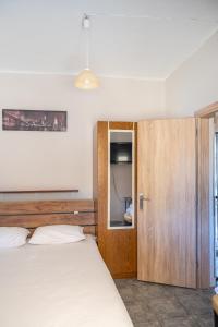 Кровать или кровати в номере Dimitri's Apartment