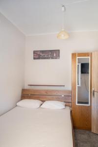 Кровать или кровати в номере Dimitri's Apartment