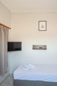 Кровать или кровати в номере Dimitri's Apartment