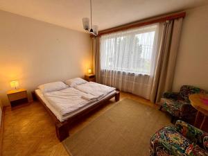 Postel nebo postele na pokoji v ubytování Apartmán Kyjov + 20 fotografií