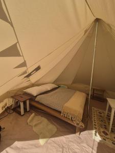Postel nebo postele na pokoji v ubytování Glamping Štôla-Tupá