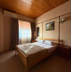Postel nebo postele na pokoji v ubytování Babilina B&B + 10 fotografií