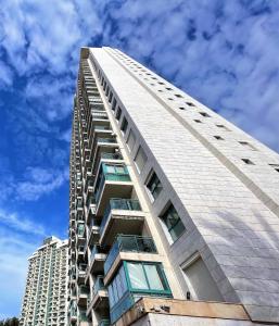 a tall building with a blue sky in the background at T1104 - Atrium Beach 3 - 2004 Finestrat in Cala de Finestrat