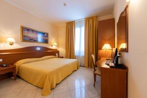 Ένα ή περισσότερα κρεβάτια σε δωμάτιο στο Hotel Ambasciata Venice - Atika & Atif