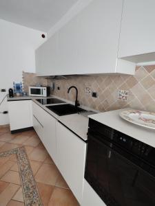 Kuchyň nebo kuchyňský kout v ubytování Casa Sara&Luca + 12 fotografií