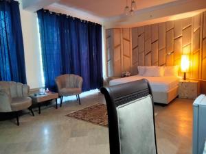 Ένα ή περισσότερα κρεβάτια σε δωμάτιο στο Luxury hospitality living +4 φωτογραφίες