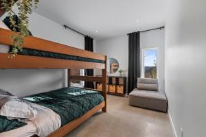 Ένα ή περισσότερα κρεβάτια σε δωμάτιο στο Havre du Mont