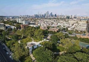 an aerial view of a city with a skyline at The View 20 Min to NYC Breakfast Included - C in Jersey City
