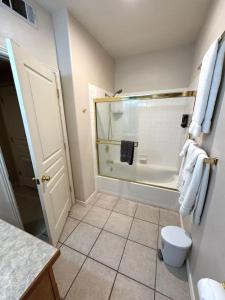 a bathroom with a shower and a toilet at Condo on Wolf Creek Golf Course in Mesquite