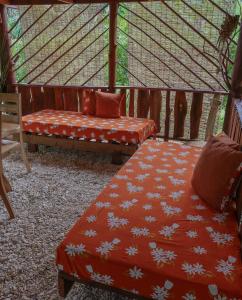 Postel nebo postele na pokoji v ubytování Fare Tearenui - Tu'i'anina Village Huahine