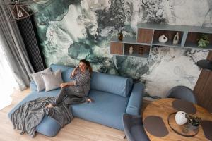 Χώρος καθιστικού στο Plaża 41 Seaside Apartment with Roof Terrace and Parking by Lion Apartments