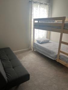 Postel nebo postele na pokoji v ubytování Beach House