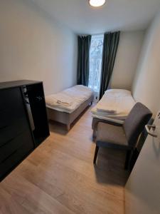 Ένα ή περισσότερα κρεβάτια σε δωμάτιο στο Central Apartment for 4
