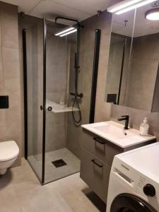 Et badeværelse på Central Apartment for 4