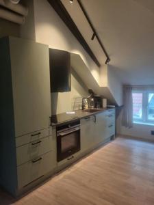 Køkken eller tekøkken på Central Apartment for 5