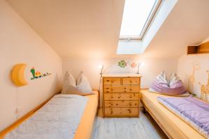 Postel nebo postele na pokoji v ubytování Ferienwohnung Kogler