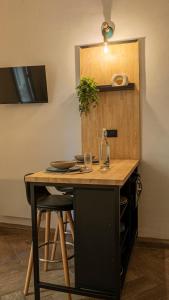 Kuchyň nebo kuchyňský kout v ubytování Studio Cozy en plein centre ville