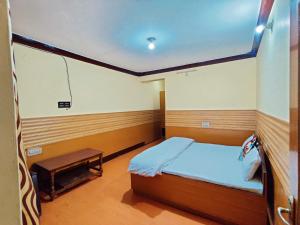 Кровать или кровати в номере Togochey Guest House