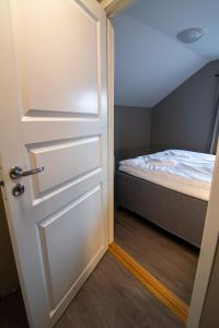 Postel nebo postele na pokoji v ubytování Storm Hotel Senja