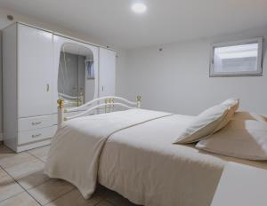 Katil atau katil-katil dalam bilik di House Dinavast Pet Friendly +16 gambar