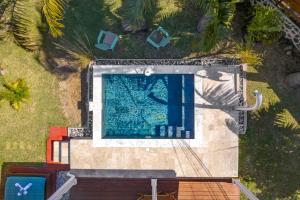 Bazén v ubytování Terre des îles - Grande Anse - lodges avec piscines privées nebo v jeho okolí