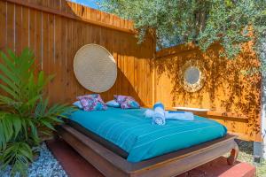 Postel nebo postele na pokoji v ubytování Terre des îles - Grande Anse - lodges avec piscines privées