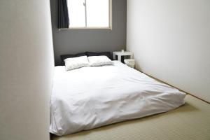 Postelja oz. postelje v sobi nastanitve 難波南Japanese Room