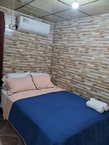 Ένα ή περισσότερα κρεβάτια σε δωμάτιο στο Apartamento de July