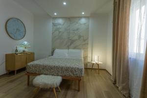 En eller flere senge i et værelse på Rooms 2,6