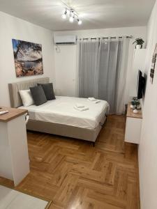 Postel nebo postele na pokoji v ubytování MonteRelax Apartments Becici