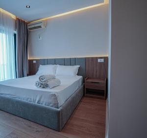 Postel nebo postele na pokoji v ubytování Hotel Sanremo Vlore