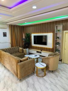 Fotografie z fotogalerie ubytování Cozy 2-Bedroom Apartment v destinaci Abudža