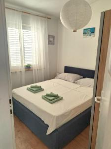 Giường trong phòng chung tại Holiday home Morgan +17 ảnh