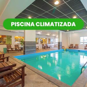 Bazén v ubytování Hotel Nacional Inn Curitiba Santa Felicidade nebo v jeho okolí