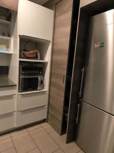 Η κουζίνα ή μικρή κουζίνα στο Penthouse Villa Ljubljana