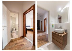 2 Bilder eines Badezimmers mit Waschbecken und Spiegel in der Unterkunft Casa Vacanza Torre Pendente - grandi camere comfort in Pisa + 33 Fotos