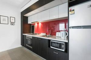 Nhà bếp/bếp nhỏ tại MStar Penthouse CBD Apartment