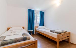 Posteľ alebo postele v izbe v ubytovaní 3 Bedroom Beautiful Apartment In Solin
