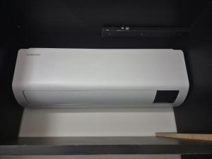 a close up of a white object in a room at Apartamento aconchegante e bem localizado in Belo Horizonte