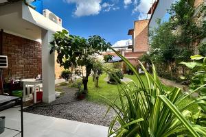 Κήπος έξω από το Casa a 5min centro 3HAB con A/C & Precioso Jardín