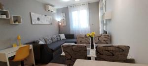 Apartment Verdi Split with free private parking space的休息区