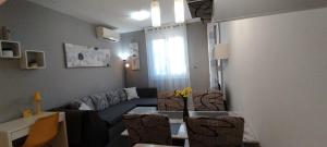 Apartment Verdi Split with free private parking space的休息区